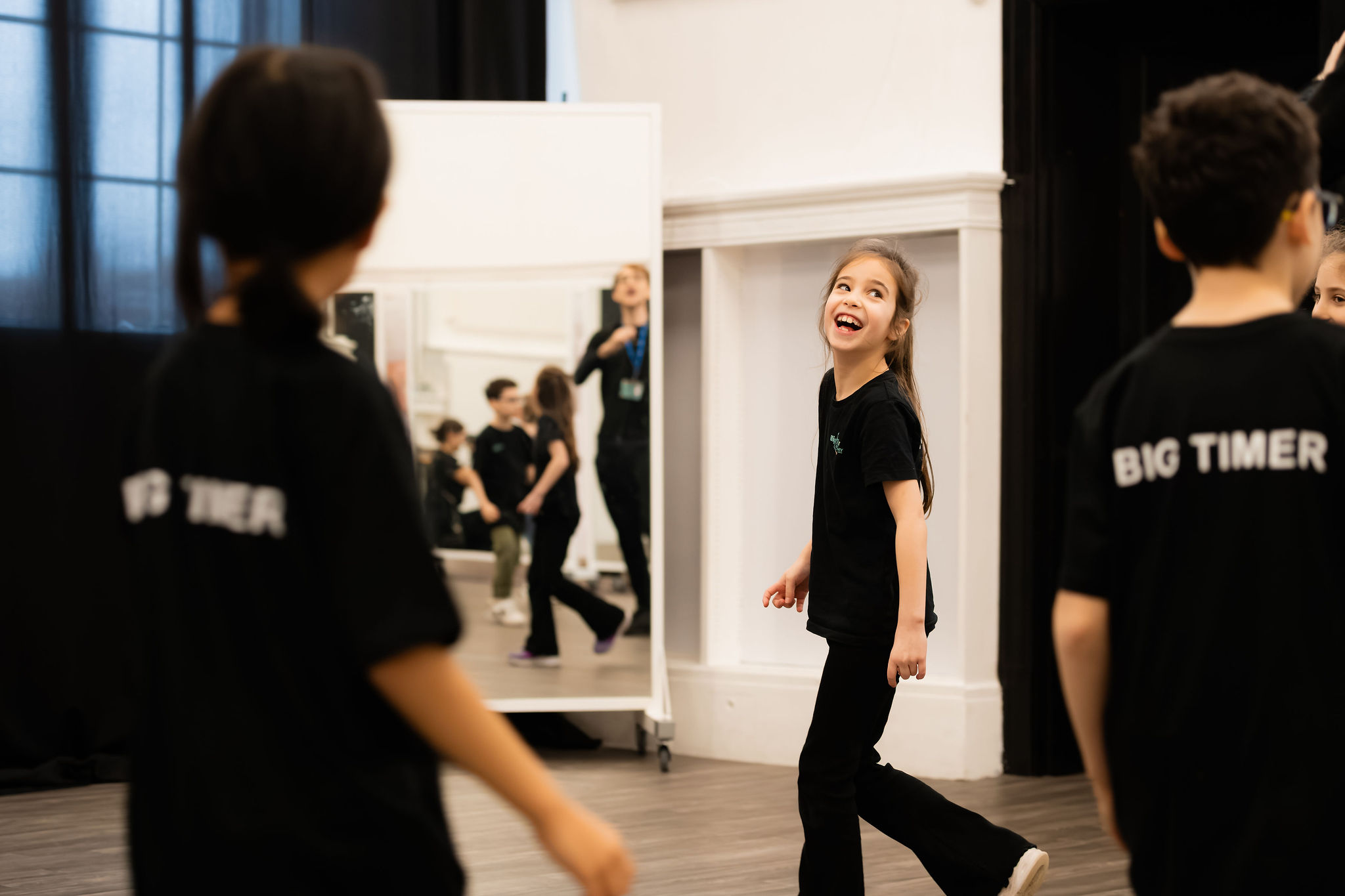 Big Time student laughing during a rehearsal